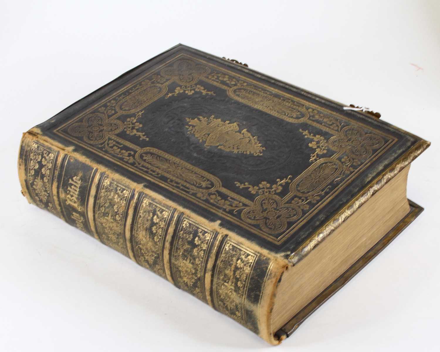 A Victorian family Bible, bound in gilt-tooled black leather