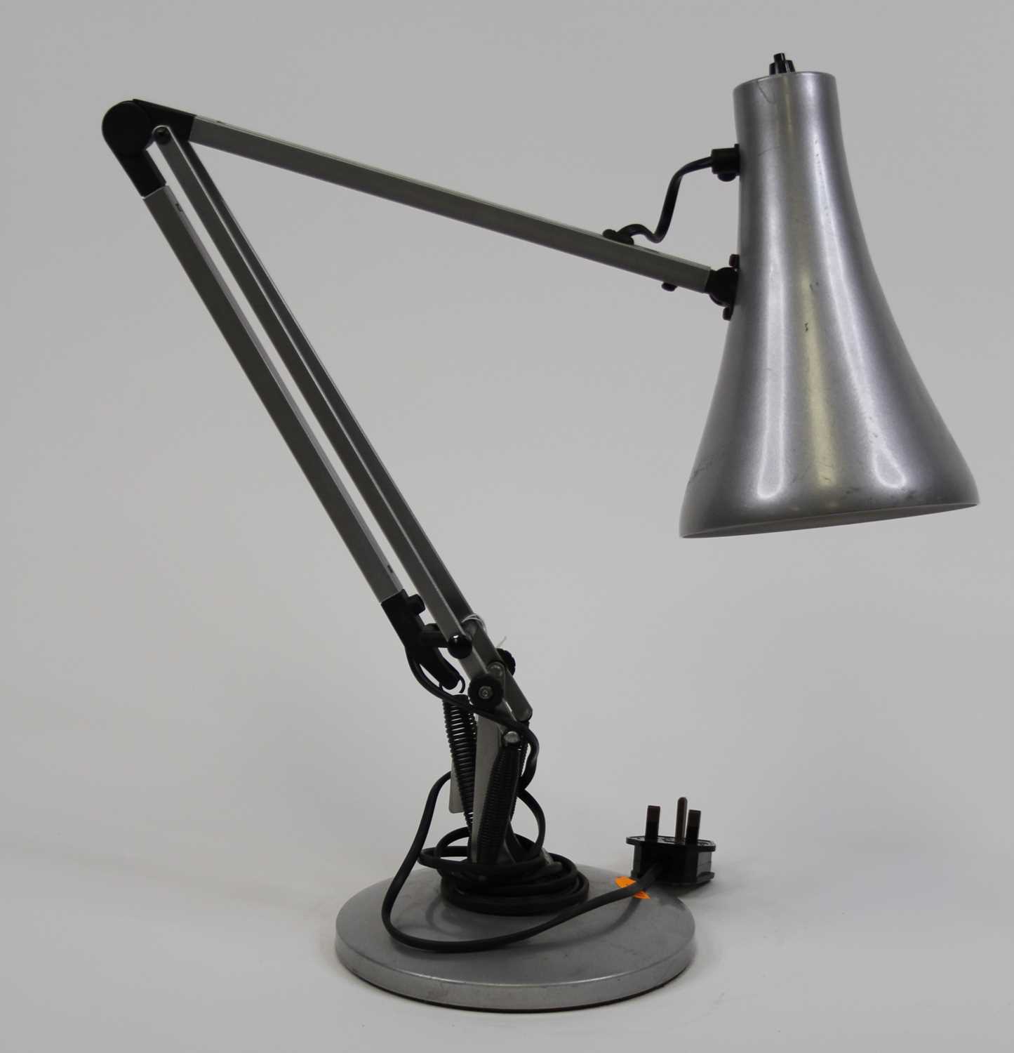 A 20th century silver painted metal anglepoise desk lamp
