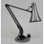 A 20th century silver painted metal anglepoise desk lamp