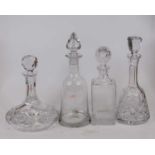 A cut glass ships decanter and stopper, h.26cm; together with a cut glass mallet shaped decanter and
