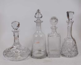 A cut glass ships decanter and stopper, h.26cm; together with a cut glass mallet shaped decanter and