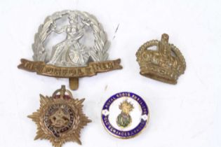 An early 20th century gilt metal and enamelled lapel badge for The Royal Scots Fusiliers Old