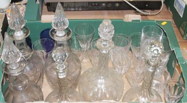 Two boxes of miscellaneous glassware to include a pair of cut glass decanters and stoppers, pair