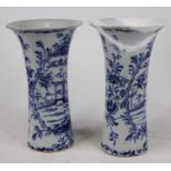 A pair of Delft sleeve vases, each having a flared rim, underglaze decorated with a bridge in a