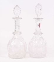 A pair of cut glass decanters, each of mallet form, height 34cm