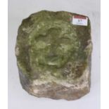 An antique sandstone block carved with a cross, h.17cm