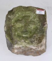 An antique sandstone block carved with a cross, h.17cm