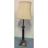 A plated metal table lamp in the form of a Corinthian column, h.26cm (including shade)