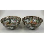 A matched pair of Chinese Canton export bowls, each enamel decorated in the famille verte palette