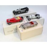 A collection of four various boxed Franklin Mint 1/24 scale diecast vehicles to include a 1931