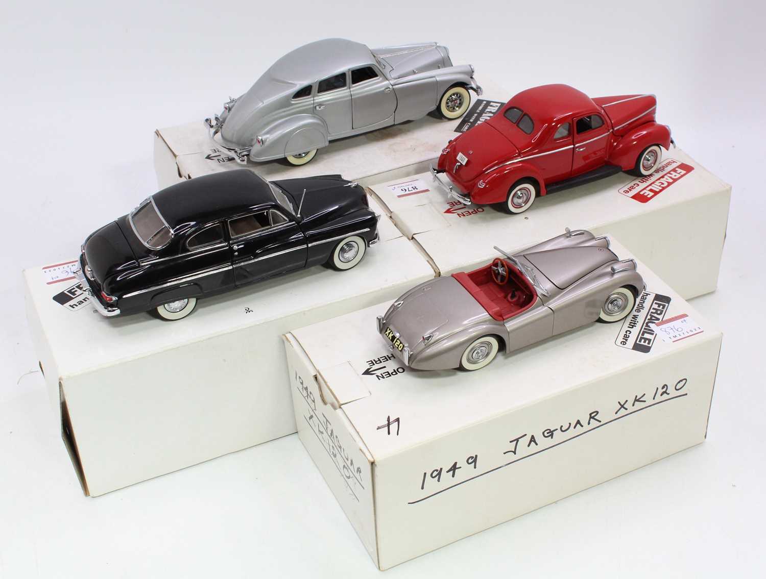 A collection of four various boxed 1/24 scale Danbury Mint diecast vehicles, to include a 1933 - Image 2 of 2