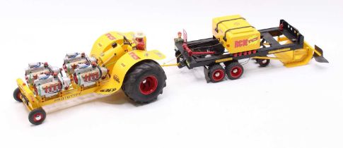 A scratchbuilt model of a Prototype TC3 racing tractor, complete with an RC10 TC3 trailer, model