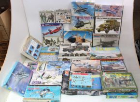 Two boxes containing a quantity of mixed mainly military related plastic kits to include Airfix,