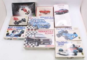 One box contains a quantity of various mixed-scale vehicle and racing car kits including SVESCI,