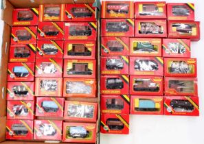 Approx. Forty Triang/Triang Hornby 4-wheeled goods wagons, a wide variety, a few duplicates. Some