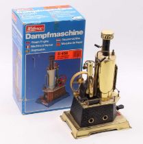 a Wilesco D456 vertical steam engine in black and brass, with burner, sight glass, steam whistle and