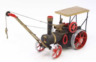 A scratch built static display model of a live steam crane traction engine, constructed from Mamod