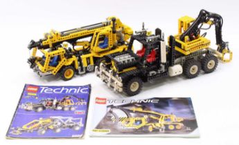 A Lego Technic made kit group to include a No. 8438 6-wheel pneumatic crane truck, together with a