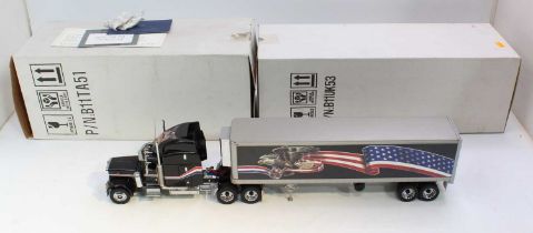 A Franklin Mint 1/32 scale diecast model of the Peterbilt truck with matching ultimate Big Rig
