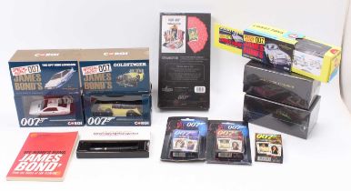 One box containing a quantity of various James Bond 007 modern release collectables to include