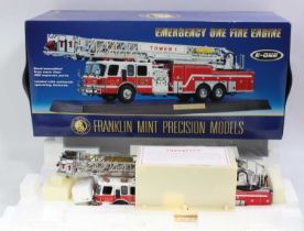 A Franklin Mint 1/32 scale diecast model of the Emergency One fire engine comprising red body with