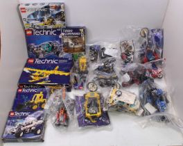 A large collection of Lego Technic boxed and loose sets, with examples including No. 8855 Prop