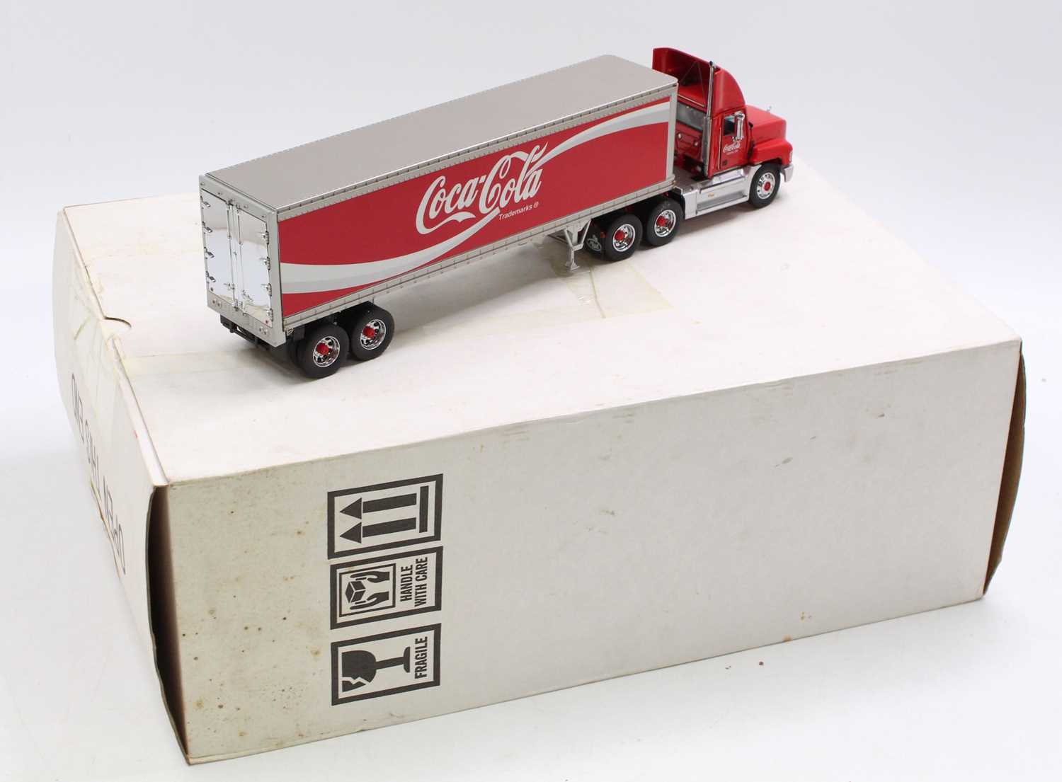 A Franklin Mint 1/43 scale diecast model of a Mack Coca Cola delivery tractor unit and trailer - Image 2 of 2