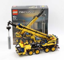 Lego Technic No. 42108 Mobile Crane, a built example complete with the instructions and a very clean