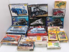 A large collection of mixed TV military and vehicle-related plastic kits, to include Heller, Revell,
