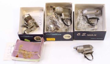 A collection of boxed and loose OX Max Power & Precision radio controlled aircraft engines to