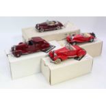Four various boxed Franklin Mint and Danbury Mint 1/24 scale diecast vehicles to include a 1957