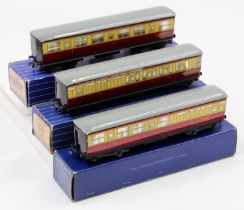 Three Hornby-Dublo D11 tinplate coaches, maroon & cream. 2 x br/3rd and one 1st/3rd. Silvering is (