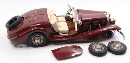 A Pocher 1/8th scale built model of a Mercedes 540K Cabrio Special 1936, finished in maroon, with