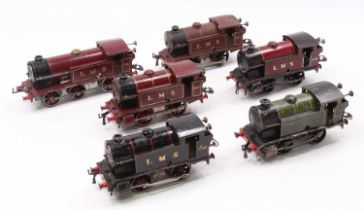 Five Hornby clockwork 0-4-0 tank locos – with a fifth ‘special’: LMS 7140 black; two LMS 2115; LMS