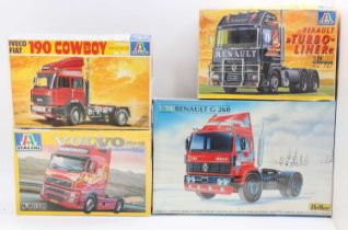 A collection of four various boxed Italeri and Heller Road Haulage and tractor unit kits to