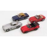 A collection of four various boxed Franklin Mint 1/24 scale diecast vehicles to include a Mercedes