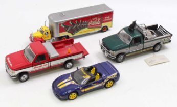 A collection of four various mixed scale Franklin Mint diecast vehicles to include an Indianapolis