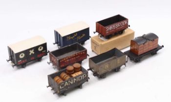 Seven goods wagons: Bakelite Leeds Model Co. ‘OXO’ goods van (VG-E); Bakelite LMC ‘Player’s