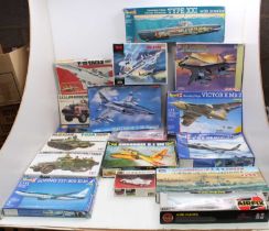 17 boxed mainly military related and vehicle plastic kits by Tamiya, Revell, and others, specific