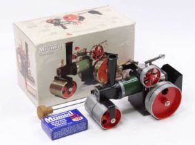 A Mamod steam roller SR1A, green body, white roof, red hubs, in its original box, very little use
