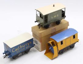 Three goods wagons: Hornby Cadbury Chocolates, total repaint, gloss, blue body, black chassis, white
