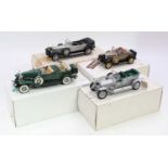 A collection of four various boxed Franklin Mint and Danbury Mint 1/24 scale diecast vehicles to