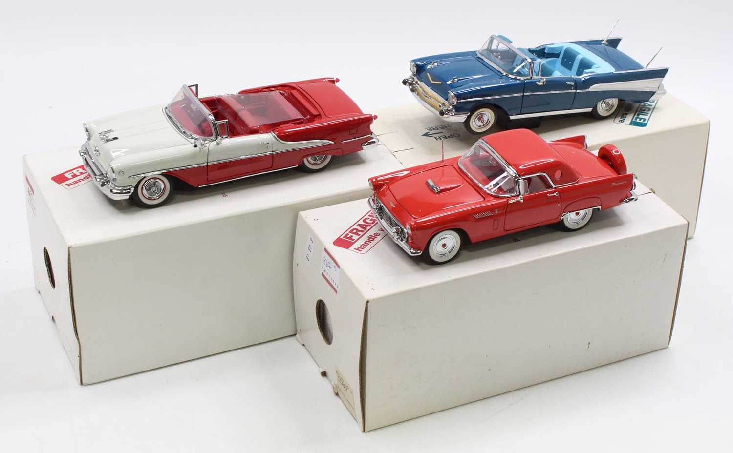 A collection of three 1/24 scale Danbury Mint 1950s diecast models to include a 1957 Chevrolet Bel
