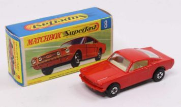 Matchbox Lesney Superfast No. 8 Ford Mustang, red-orange body, with a white interior, and a black
