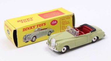 South African Dinky Toys No. 194 Bentley Coupe, lime green body, with a red interior, black tonneau,