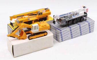 A collection of three various boxed 1/50 scale mobile crane and construction vehicle group including