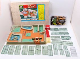 A Britains No. 4712 model zoo housed in the original card box together with a box of assorted
