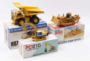 A collection of Japanese Shinsei and Goodswave, Komatsu-related construction vehicles including a