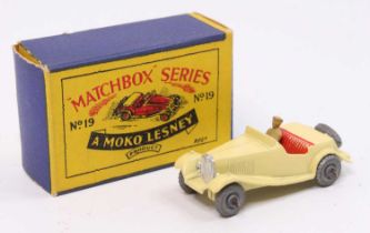 Matchbox Lesney No. 19 MG TD Sports Car, cream body, with red seats, tan driver, and metal wheels, a