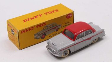 Dinky Toys No. 176 Austin A105 saloon comprising a grey body with red racing stripe and spun hubs,